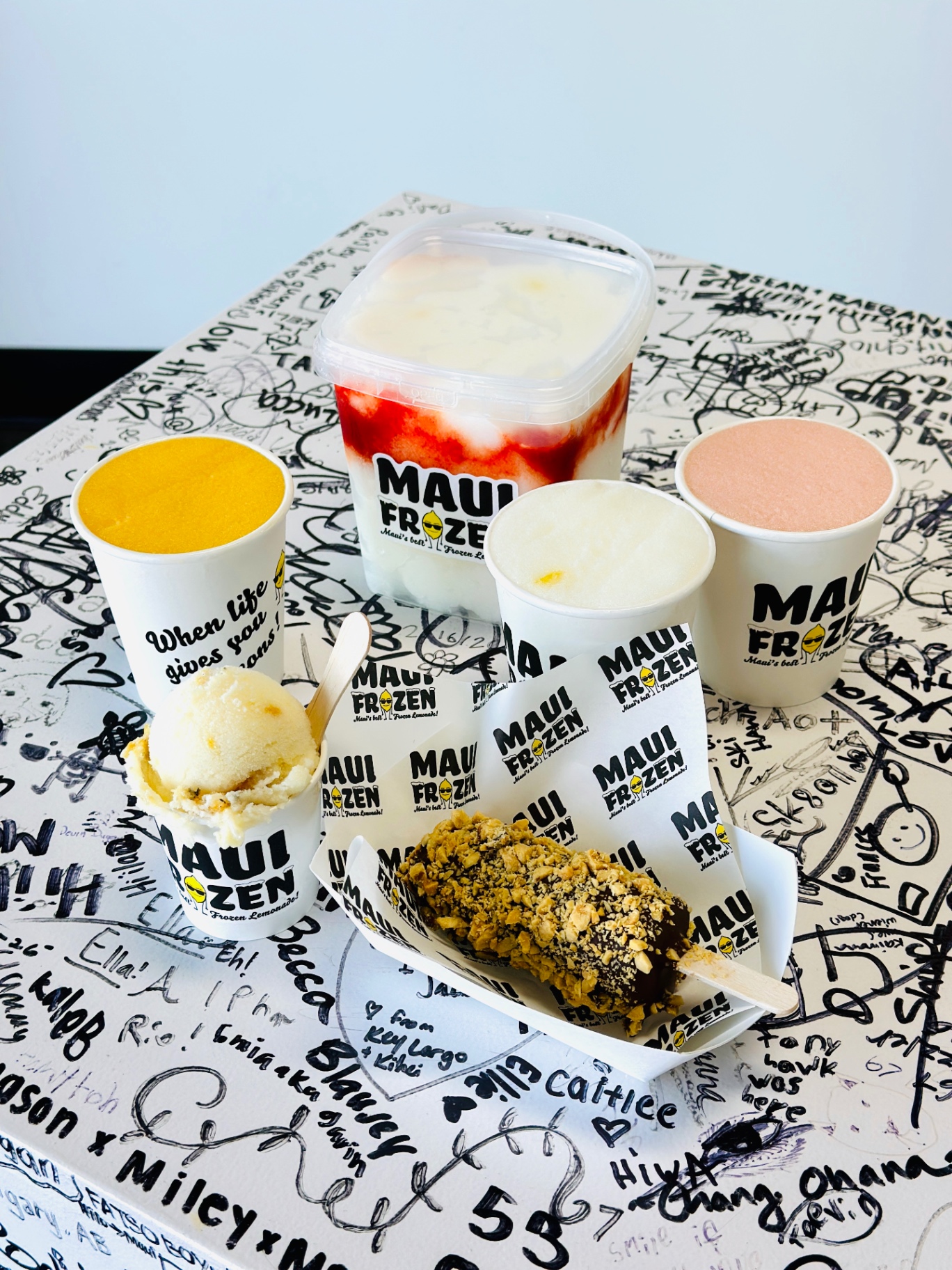 Maui Slush and Pineapple Scoop Ice™ laid out on a serving table