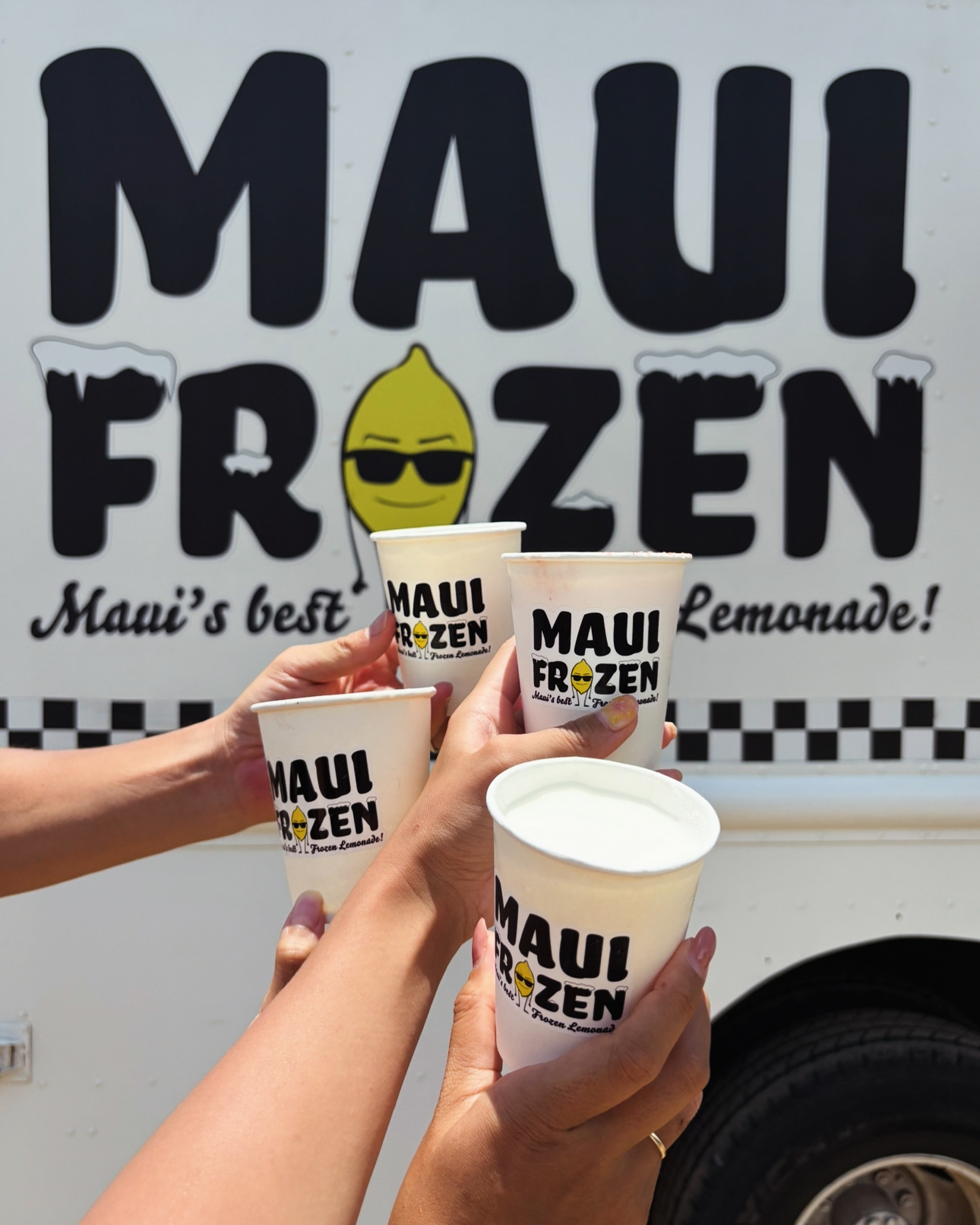 Guests with Maui Slush cups at a Maui Frozen event